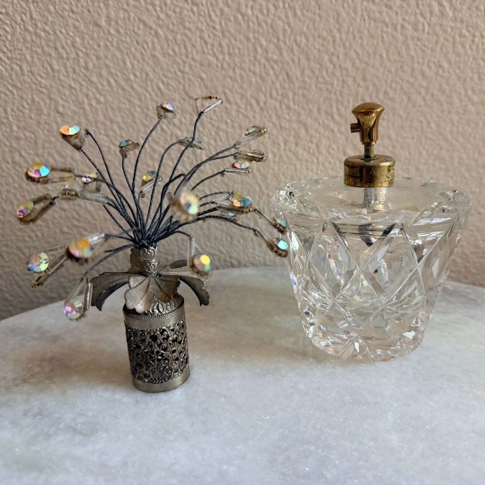 Vintage Crystal Perfume Bottle with Decorative Silver Accent